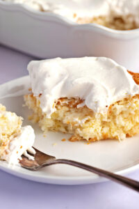 A Slice of Pineapple Angel Food Cake with a Fork