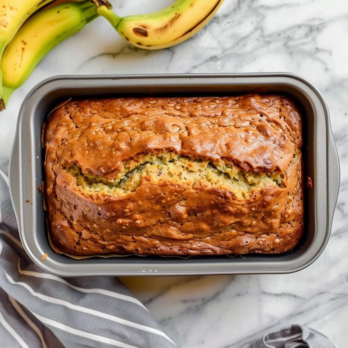 Banana zucchini loaf in a baking pan.