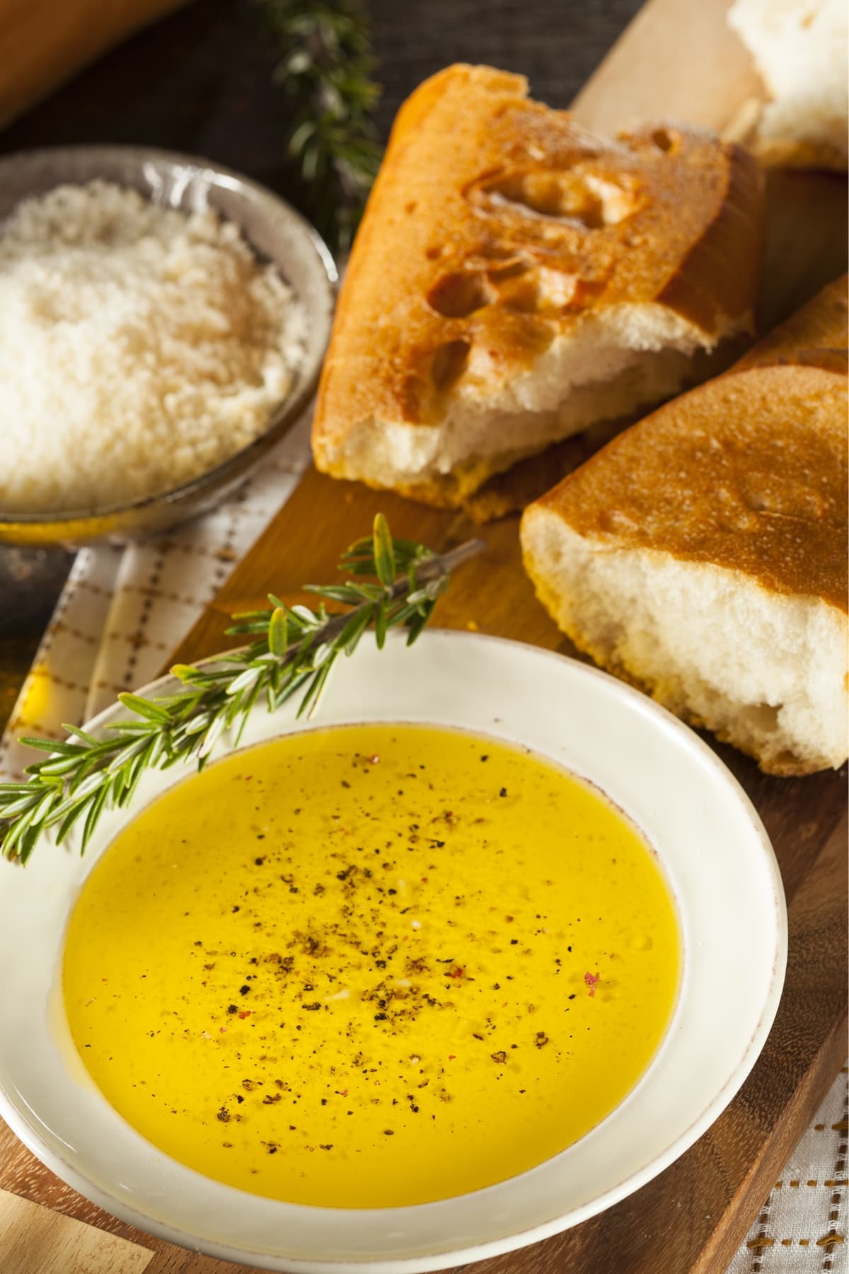 Homemade Carrabba’s Bread Dip on a Wooden Board