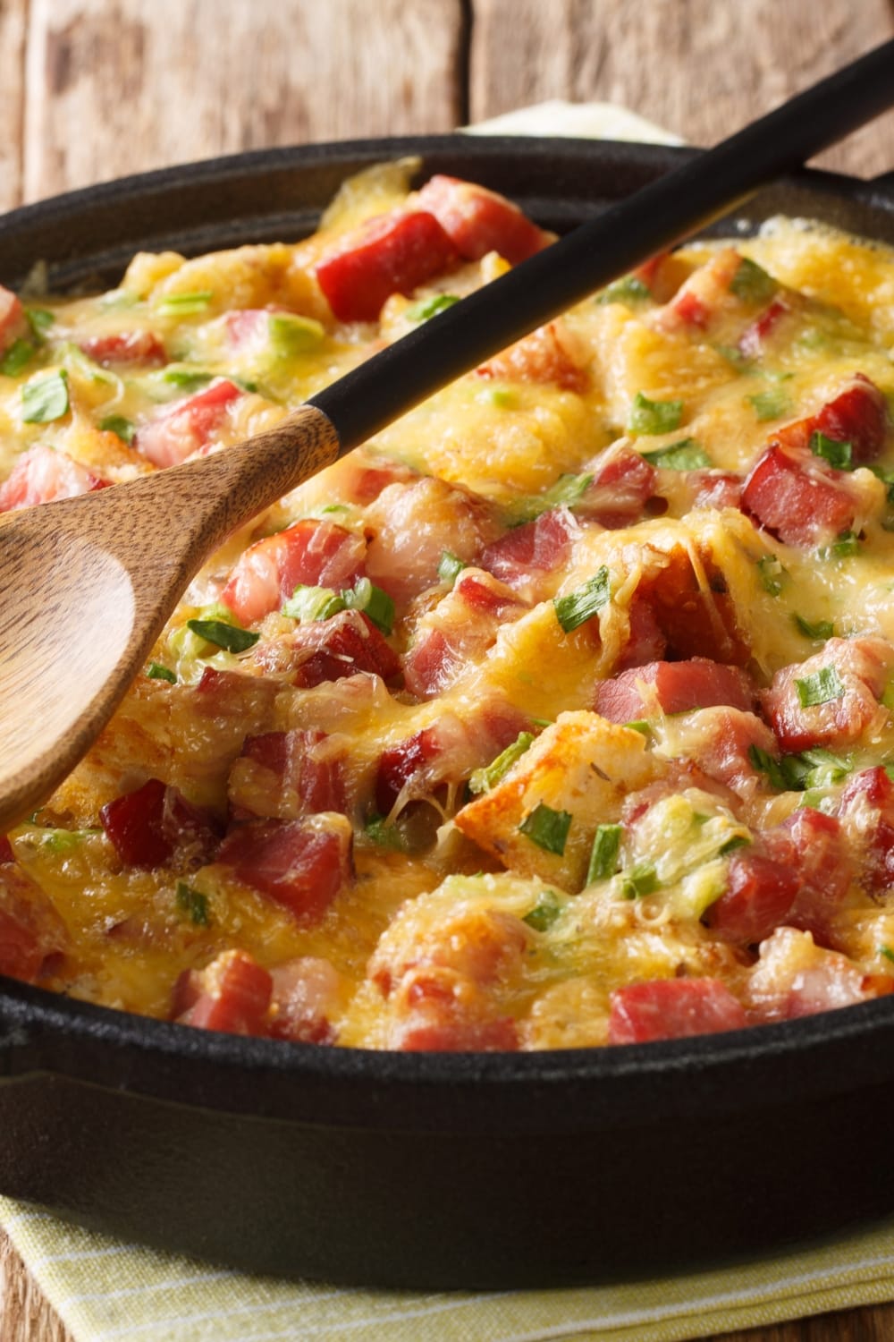 Homemade Ham and Cheese Strata with Onions Cooked on a Cast Iron