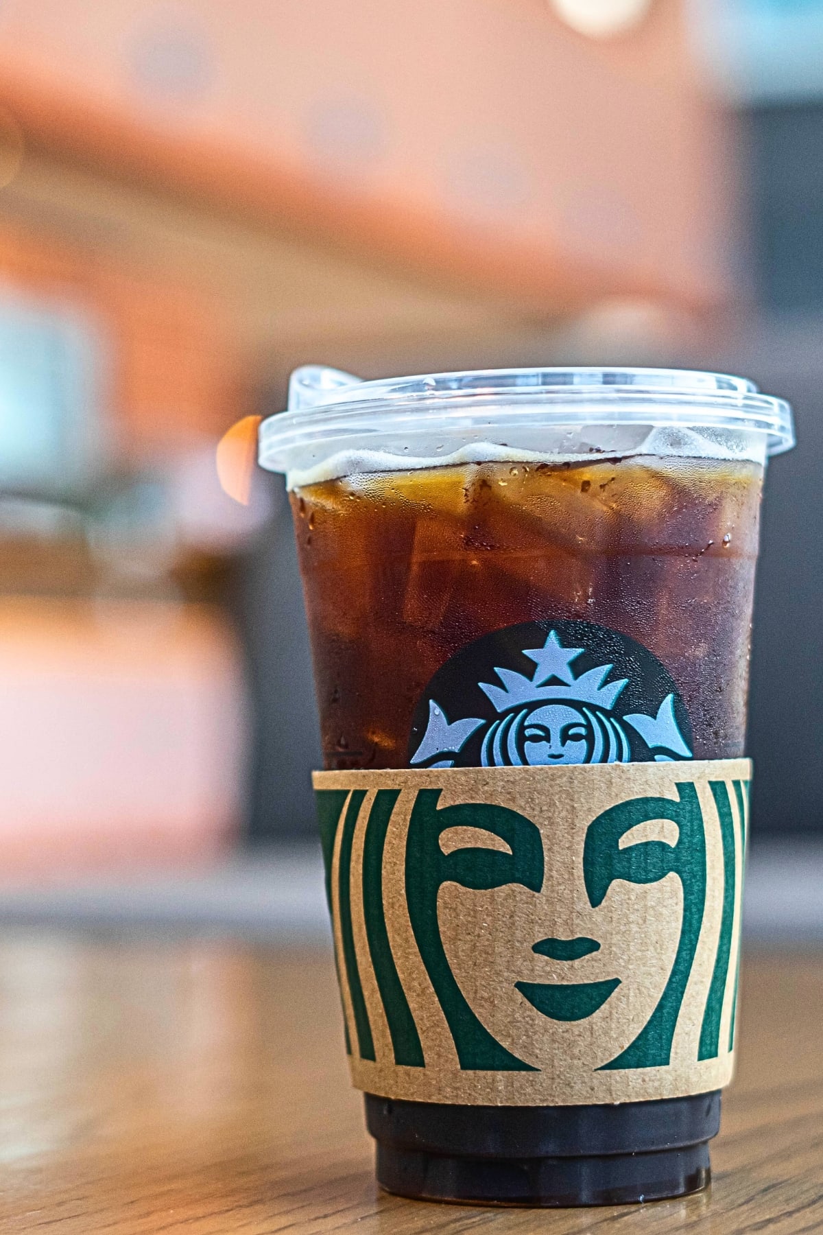 Starbucks iced coffee on a wooden table 